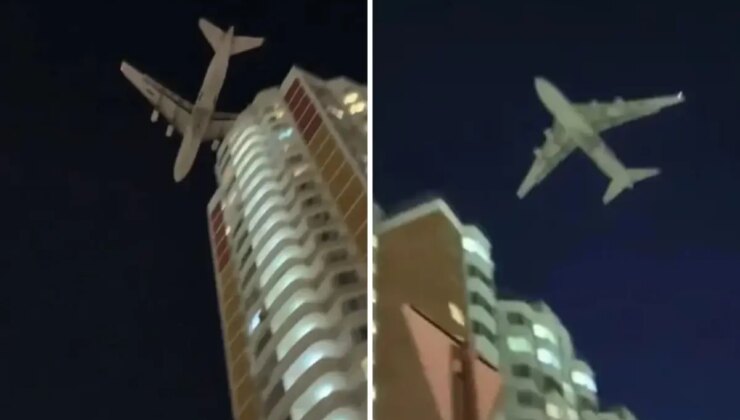 Dünyanın en büyük kargo uçağı droneden kaçarken az daha binalara çarpıyordu